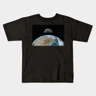 Planet Earth and Moon against dark starry sky Kids T-Shirt